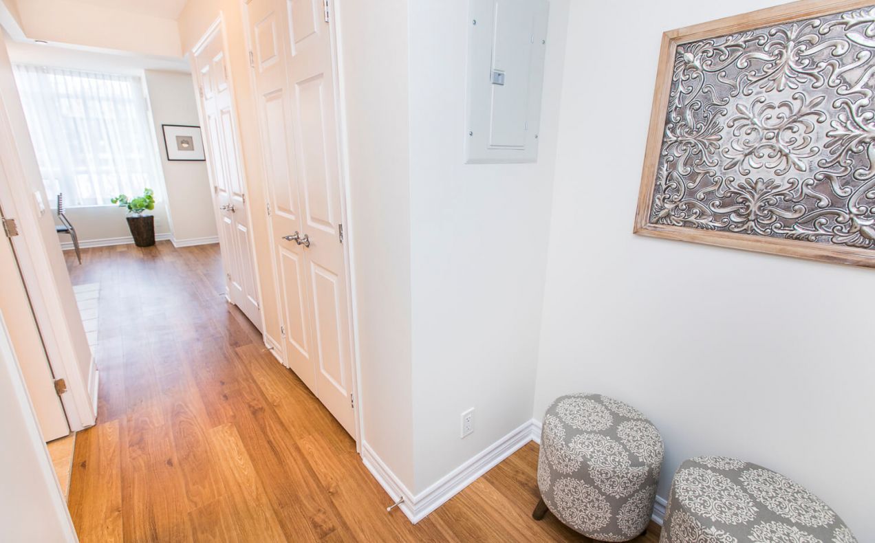 Hallway with plenty of closet space in a bachelor/studio apartment